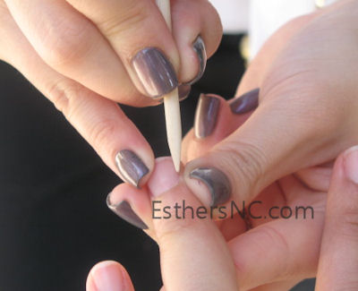 clean the nails from shellac residue with wood stick